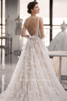 a woman in a wedding dress looking back