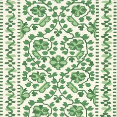 a green and white pattern on fabric