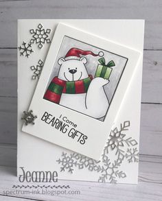 a christmas card with a polar bear holding a present