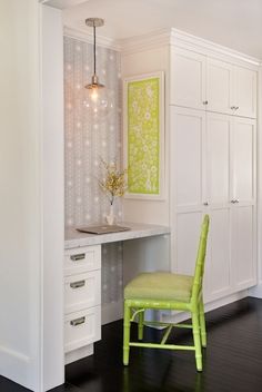 a white desk and chair in a room