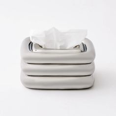 an inflatable tissue dispenser on a white background