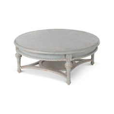 an old white coffee table on a white background