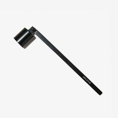 an image of a black object on a white background that looks like it could be used as a makeup brush