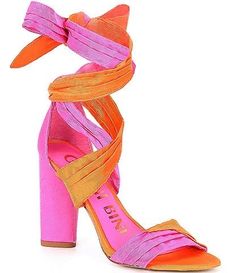 an orange and pink high heeled sandal with ties on the front, side view