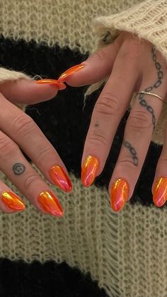 A set of hands showing stiletto-shaped nails painted in a glossy, vibrant orange shade. Orange Nail Ideas, Bold Nail Art, Nail Ideas For Summer, Neon Orange Nails, Orange Nail, Mens Nails, Summery Nails, French Acrylic Nails, Rock In Rio