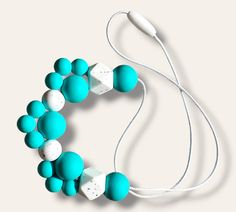 a white and blue necklace with earphones attached to it