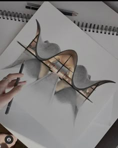 someone is drawing an image with pencils on paper