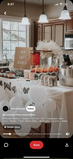 a table with balloons and other items on it