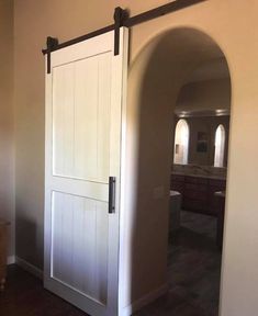 an open door in the middle of a room