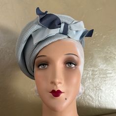 This Is A Beautiful Vintage Tam That Could Be From The 1940s' To The 1970s'. It Is Made Of Very Fine Baby Blue Straw, And Is Folded And Shaped In A Unique Way, As Shown In The Photos. There Is A Wonderful Two-Tone Blue Grosgrain Bow At The Front Side. A Tam, Short For Tam O’ Shanter, Is A Soft, Voluminous Round Hat, Usually With A Round Seam That Joins The Flat Crown To The Sides. Tams Often Have A Band Around The Bottom That Gathers In The Voluminous Crown And Secures The Hat To The Head Of Its Wearer. There Is Only A Size Label: Large (Since The Hat Sits Sideways, It Would Fit Most Head Sizes) This Is An Authentic Piece Of Fashion History! This Hat Is In Wonderful Vintage Condition & Adjustable Retro Blue Hats, Vintage Blue Hat With Curved Brim, Tam O' Shanter, Round Hat, Vintage Baby, Hats Vintage, Fashion History, Baby Blue, Two Tone