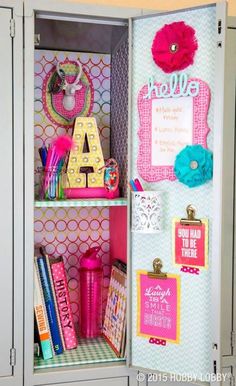 an open locker with school supplies and decorations on the inside, including magnets, pens, paper clips, and other personal items