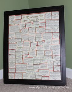 a framed book page with words written on it in black and brown frame against a green wall