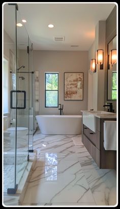 a large bathroom with marble flooring and white walls, along with a walk in shower