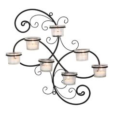 a wrought iron candle holder with five candles