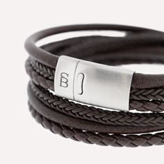 This wraparound bracelet stack, handcrafted from fine grade genuine leather and meticulously braided, is a timeless classic marked by elegance.- WIDTH: 12 mm- MATERIAL TYPE: 100% genuine Cowhide leather- CLASP COLOR: Brushed silver- CLASP MATERIAL: 316L stainless steel- CLASP TYPE: Magnetic Double Wrap Bracelet, Gold Armband, Black Edition, Handcrafted Leather, Bracelet Stack, Modern Man, Timeless Classic, Cowhide Leather, Wrap Bracelet