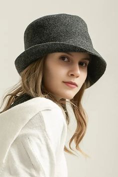 Classic Elegance Meets Modern Comfort in Wool Felt Hat This 100% woolen ladies' hat is an autumn-winter staple, offering exceptional warmth with a touch of sophistication. Featuring a flat crown with a stylish upturned brim, it merges modern fashion with classic aesthetics. Crafted from pure sheep's wool, it provides a comfortable, breathable fit while ensuring excellent insulation. Whether for daily wear or as a statement piece, this cloche hat enhances facial contours, while its cloche hat sty Classic Cloche Hat With Curved Brim For Fall, Classic Fall Cloche Hat With Curved Brim, Classic Solid Cloche Hat For Fall, Classic Solid Color Cloche Hat For Fall, Wide Brim Wool Fedora For Winter, Classic Fall Cloche Hat, Chic Wool Fedora For Fall, Classic Winter Cloche Felt Hat, Classic Cloche Felt Hat For Winter