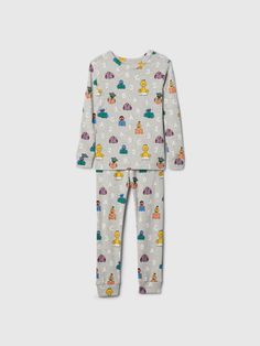 Soft cotton pajama top and pants set with a cozy brushed interior.  Crewneck.  Long sleeves.  Elasticized waist at PJ pants.  Assorted Sesame Street allover prints.  Made with 100% organically grown cotton, which is grown without the use of synthetic pesticides and fertilizers.  This product was made in a factory that invests in gender equality and women’s empowerment.  Through RISE Reimagining Industry to Support Equality) and Gap Inc. ’s program P. A. C. E.  Personal Advancement & Career Enhan Toddler Pajamas, Gender Equality, Top And Pants Set, Support People, Pj Pants, Cotton Pyjamas, Pajama Top, Baby Gap, Pesticides