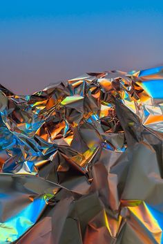 an abstract image of shiny metal foil