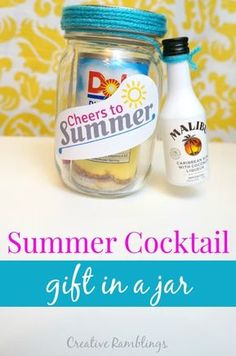 two bottles of summer cocktail sitting next to each other on a table with the words cheers to summer gift in a jar