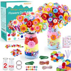 a vase filled with lots of colorful buttons next to scissors and other crafting supplies