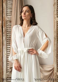 Fitted White V-neck Robe, Elegant Fitted Open Front Robe, Chic White Maxi Dress For Loungewear, Chic White Dresses With Kimono Sleeves, Elegant White Wrap Maxi Dress, White Flowy Dress With Kimono Sleeves, Elegant White Open Front Robe, White Long Sleeve Party Robe, White Kimono Sleeve Robe For Wedding Night