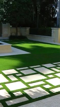 an outdoor living area with artificial grass