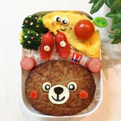 a bento box with some food on it