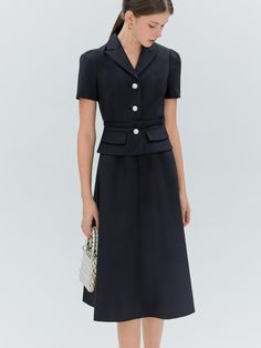 This product, the Erika Flare Dress, encapsulates a timeless elegance with a fitted bodice that flares into a graceful midi-length skirt. The addition of a matching belt enhances the dress's classic silhouette, drawing attention to the wearer's waist. It features a neatly tailored collar and a sleek button-down front, which add a touch of formality to the otherwise soft-flowing form. - This Erika Flare Dress includes a neatly tailored collar that frames the neckline beautifully.- The included belt cinches at the waist, providing a flattering shape and refined detail.- A button-down front offers a versatile closure that is both functional and stylish.- The dress's skirt flares gently from the waist, creating a silhouette that moves with grace and poise. Corporate Dresses Offices Classy, Elegant Midi Dress Classy, Midi Dress Classy, Work Photos, Model Clothes, Work Outfit Office, Corporate Dress, Silhouette Drawing, Dramatic Classic