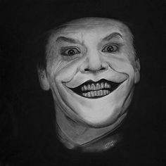 a black and white drawing of the joker