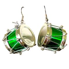 pair of green and white glass beaded drum earrings on silver earwires against a white background