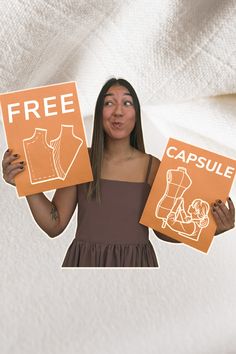 a woman holding two signs that say free and capsule
