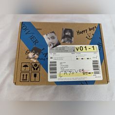 a cardboard box with some pictures on it