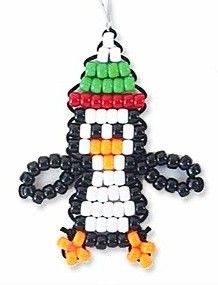 an ornament made to look like a bird with beads on it's body