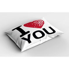 a pillow with the words i love you written on it and a red heart in the middle