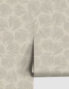 a wallpaper with an abstract design in grey and white colors, on top of a beige background