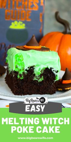 a piece of cake on a plate with green frosting and pumpkins in the background