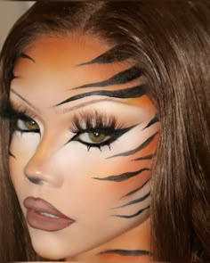 https://www.instagram.com/p/C_Je_sMyQSy/?igsh=MzRlODBiNWFlZA== Tiger Outfit Halloween, Cute Tiger Costume, Big Cat Halloween Costume, Women Tiger Costume, Tiger Stripe Makeup, Animal Make Up Ideas, Lepord Makeup Women, Halloween Tiger Costumes Women, Animal Print Halloween Costumes