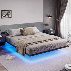 a bed with blue lights on the side and a white rug in front of it