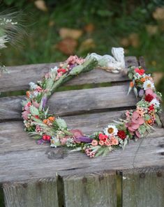 A rustic, colorful flower crown made of dried and stabilized plants is the perfect addition to the bride's or bridesmaid's styling. In this unusual flower crown there are stabilized eucalyptus, tea tree and other colorful dried and stabilized flowers. The flower crown is made with great attention to detail A head wreath is a perfect proposition for a wedding, bachelorette party and a gift, photo shoot, festival or birthday Flower crown size - tied at the back with a ribbon Dried and stabilized plants are durable provided they are stored properly, which is away from sunlight to avoid color fading, heat sources, extreme cold and moisture. I try to make my flower designs look like the picture, but since I use natural flowers, there may be variations in shade. If you would like to order more p Wild Flower Crown, Wildflower Wedding Crown, Spring Flower Crown, Flower Crowns, Floral Head Wreath, Scottish Flowers, Flower Head Wreaths, Crown Aesthetic