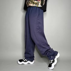 "Vintage Jordan Sweatpants Navy Blue Polyester Grey Ankle Jumpman Baggy Fit Silver Tag has Ankle Zippers Y2K Skate / Streetwear Great Condition: 9/10 Men's Size: X-Large My Hands in Pockets = It has Pockets No Hands in Pockets = Does Not Have Pockets Drawstring Will be Visible in Forward Pic, if not Visible it Does Not Have a Drawstring About me: I am 6' 0\" for reference I generally wear a Large (32\" inseam) I Model XS to 2XL sweatpants, I find that you can often size up or down with 95% of sweatpants and they fit the same" Jordan Sweatpants, Hands In Pockets, No Hands, Skate Streetwear, Baggy Fits, Mens Trousers, Jogging, Jordan, Sweatpants