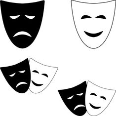 four masks with faces drawn in black and white