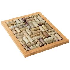 a wooden box filled with lots of wine corks