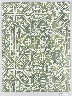 an abstract green and white pattern on paper