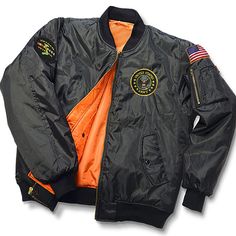 an orange and black jacket with patches on it