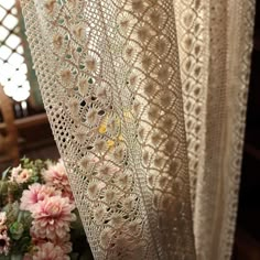 lace curtains with flowers in the background