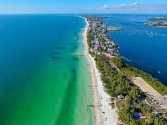 an aerial view of the beach and ocean