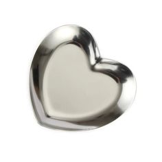 a metal heart shaped dish on a white background