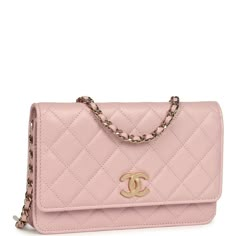 This Wallet on Chain is in pink caviar with gold tone hardware and has a front flap with a textured CC emblem, and a long gold tone metal and pink leather chain.The interior is lined in pink leather and grosgrain fabric and features a top zipper pocket under flap, a slit front pocket, a zipper compartment with leather pull, and an open pocket with six credit card slots.Collection: 22BOrigin: FranceCondition: New and never worn Accompanied by: Chanel box, Chanel dustbag, carebook, felt and ribbon Chanel Classic Wallet On Chain, Chanel Wallet On Chain, Chanel Box, Chanel Purse, Wallet On Chain, Burberry Shoes, Chanel Wallet, Leather Pulls, Vuitton Bag