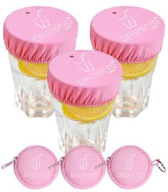 four pink and yellow drink cups with matching lids