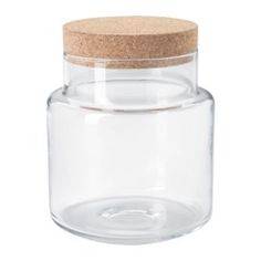 an empty glass jar with a cork lid